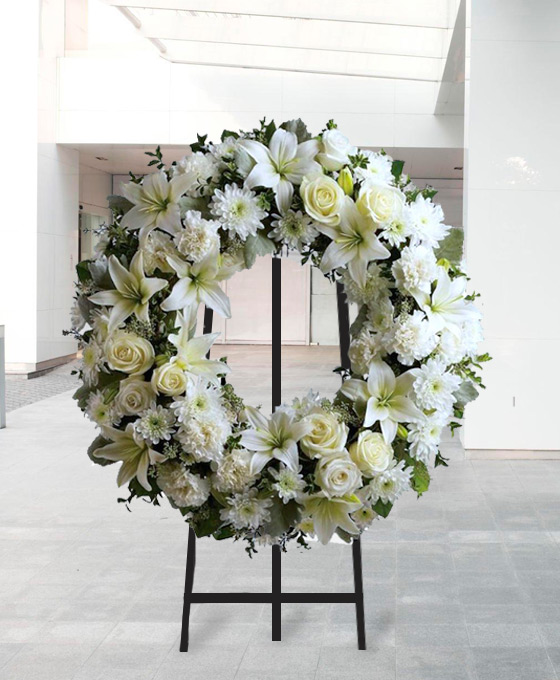 Flores blancas para difuntos de Santa Coloma